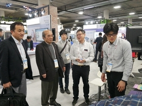 President Yokoya and Executive Director/Director General Watanabe at the NAIST booth