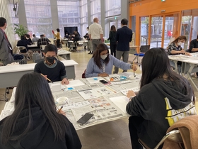 Participants concentrating on their writing